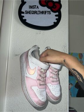 pink low top nikes
